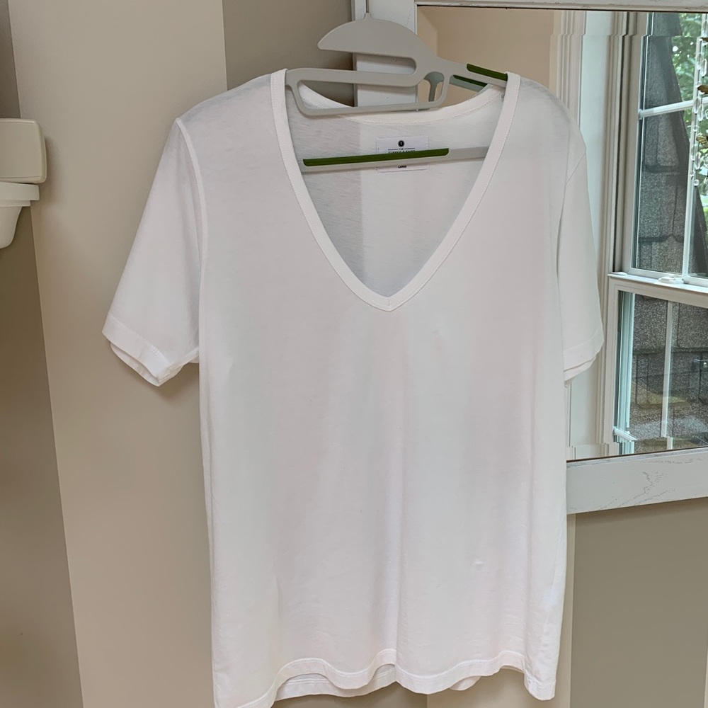 White tee shirt by the Classic T - Shirt Company. Size large. No tag